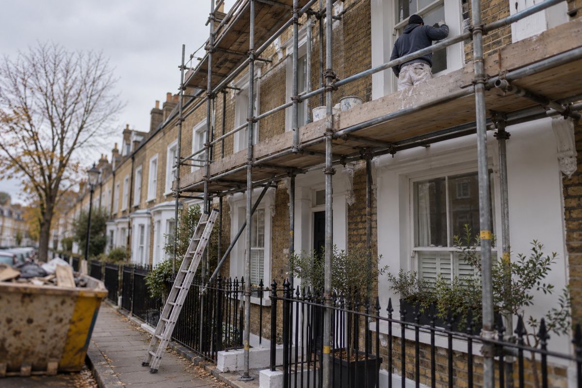 Scaffolding on the front of a three-storey London terraced house